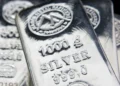 Why has the price of silver hit a record high?