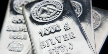 Why has the price of silver hit a record high?