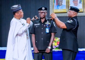 Ambassador Malami Ma’aji Assists IGP Disu in Decorating Newly Promoted CP Umar Muhammed Iya